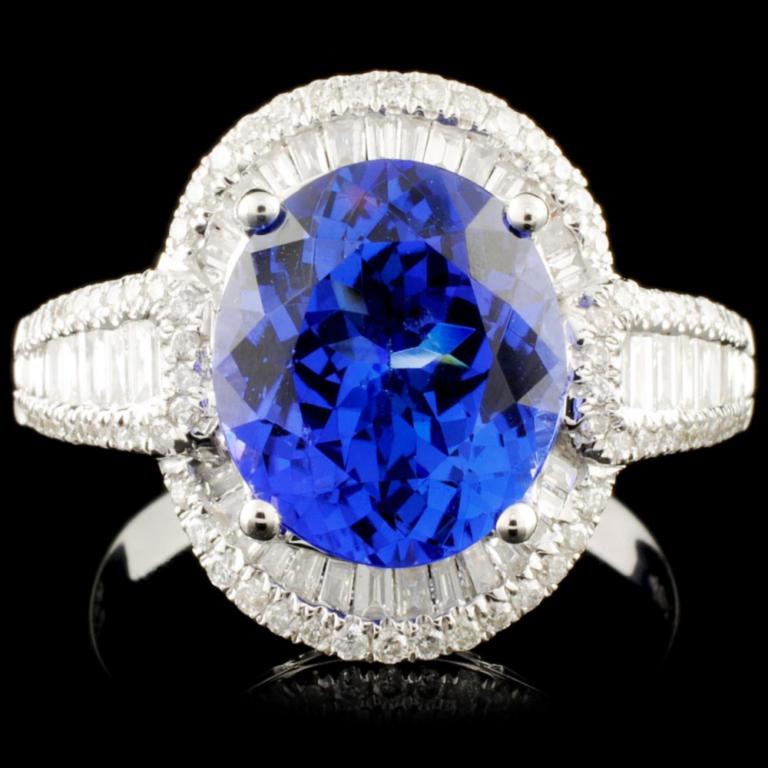 18K Gold 3.54ct Tanzanite & 0.66ctw Diamond Ring: Estimated Retail Replacement Value: $10,003.00 Ref: BAS5716 Item no.: FA205583012-BR6566ATZ1 Specification: Gold Content: 18K White Gold Weight of Item: 5.20 grams Country Made: U.S.A. Ring Size: 7 Ma
