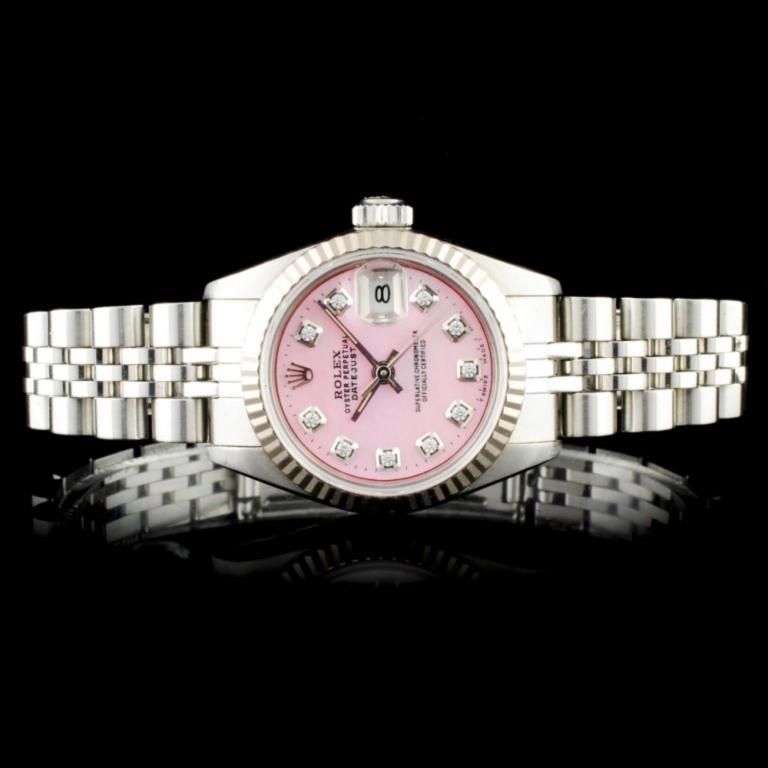 Rolex DateJust 18K & SS Ladies Wristwatch: Estimated Retail Replacement Value: $11,250.00 Ref: IRA12005 Item No.: ARXU-029 Specification: Model: DateJust Oyster Movement: Perpetual, Self Winding Function: Date Case Size: 26mm Case Material: St