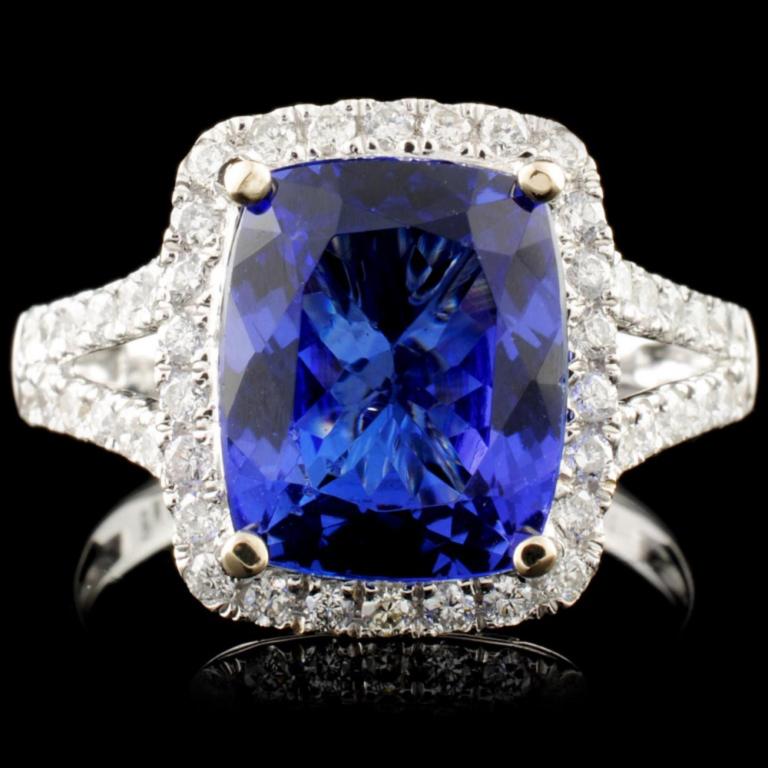 18K Gold 3.89ct Tanzanite & 0.54ctw Diamond Ring: Estimated Retail Replacement Value: $13,800.00 Ref: BAS5520 Item no.: FA2055470021- BR6565ATZ1 Specification: Gold Content: Solid 18K White Gold Weight of Item: 5.35 grams Size: 7.25 Country Made: U.S