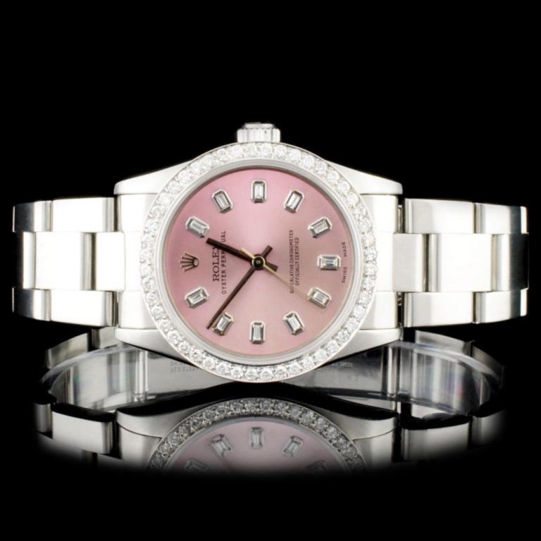 Rolex SS 31MM Oyster Perpetual Diamond Watch: Estimated Retail Replacement Value: $18,000.00Ref: WAG16000Item No.: ARXQ005Specification:Model: Rolex Mid-Size Oyster Perpetual WatchMovement: Perpetual, Self Winding ChronometerFunction: Instantaneo