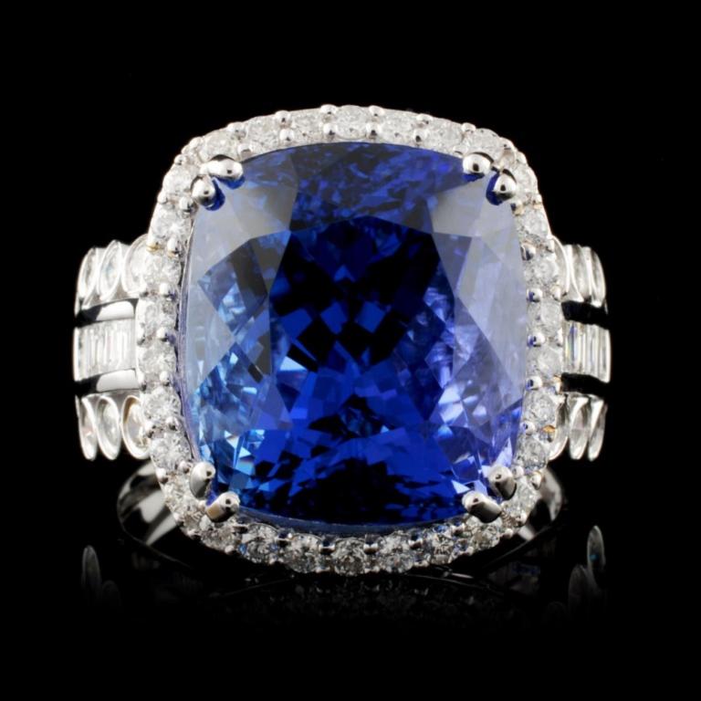 18K Gold 12.70ct Tanzanite & 1.23ctw Diamond Ring: Estimated Retail Replacement Value: $60,000.00Ref: WAG24000Item no.: FA2053273011-BR6327ATZGold Content: 18K White GoldWeight of Item: 8.15 gramsSize: 7.5Main Gemstone: Natural TanzaniteShape: Cushion