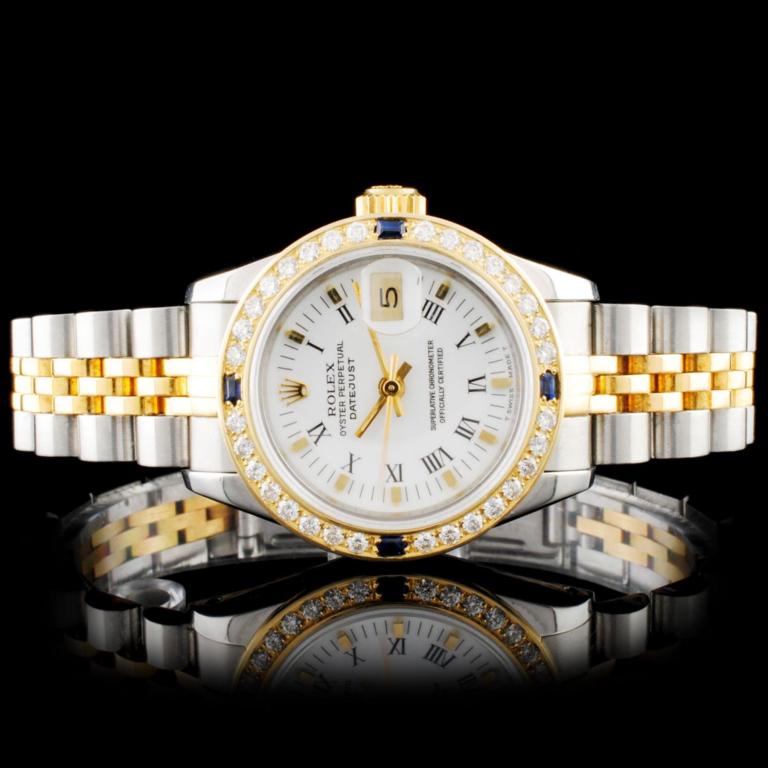 Rolex DateJust YG/SS Diamond Wristwatch: Estimated Retail Replacement Value: $12,850.00 Ref: BAS14000 Item No.: ARXY-0004 Specification: Model: DateJust Movement: Perpetual, Self Winding Function: Instantaneous Quick Set Date Case Size: 26mm