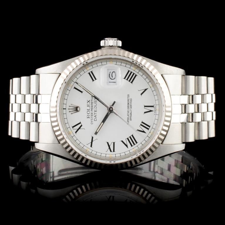 Rolex DateJust 18K & Stainless Steel Watch: Estimated Retail Replacement Value: $13,500.00Ref: IRA14000Item no.: ARXU-002Specification:Model: DateJust Oyster Perpetual, 36mmMovement: Perpetual, Self-winding, ChronometerCase Material: Stainless