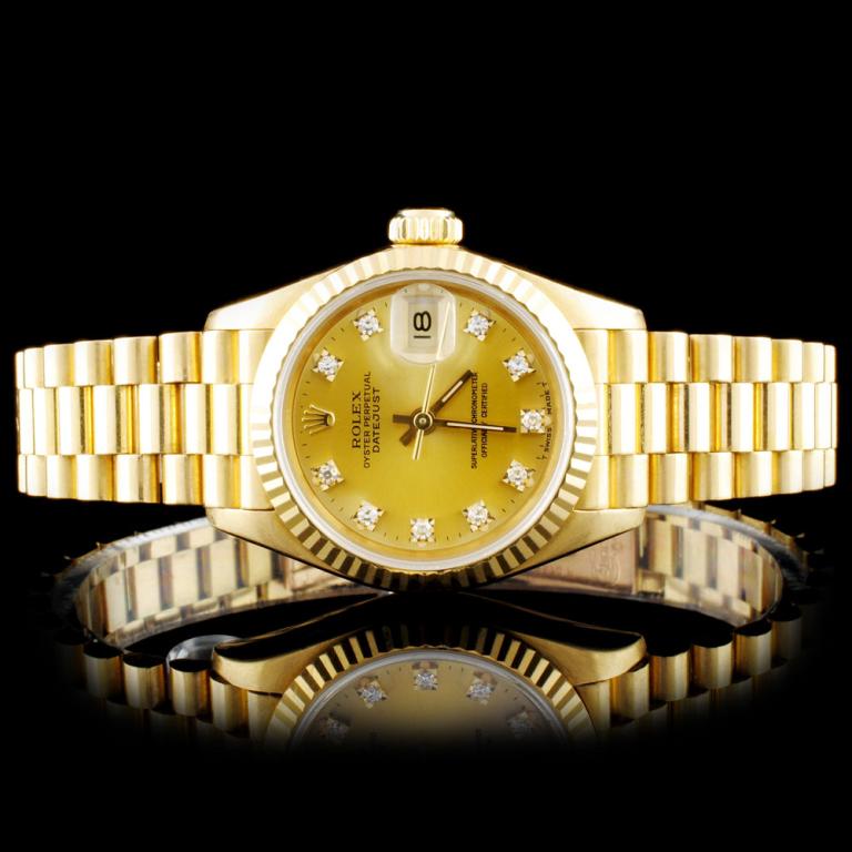 Rolex 18K YG Diamond Ladies Wristwatch: Estimated Retail Replacement Value: $17,800.00Ref: BAS24000Item No.: ARXZ-006Specification:Model: DateJustMovement: Perpetual, Self WindingFunction: Instantaneous Quick Set DateCase Size: 26mmCase Mat