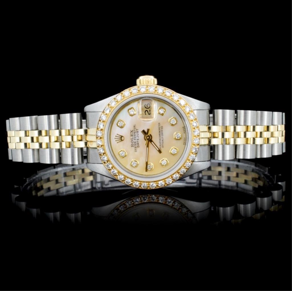 Rolex YG/SS DateJust Ladies Diamond Watch: Estimated Retail Replacement Value: $20,000.00Ref: WAG14500Item No.: ARX0140Specification:Model: Oyster Perpetual DateJust Movement: Perpetual, Self-WindingCase Material: Stainless SteelBracelet Mater