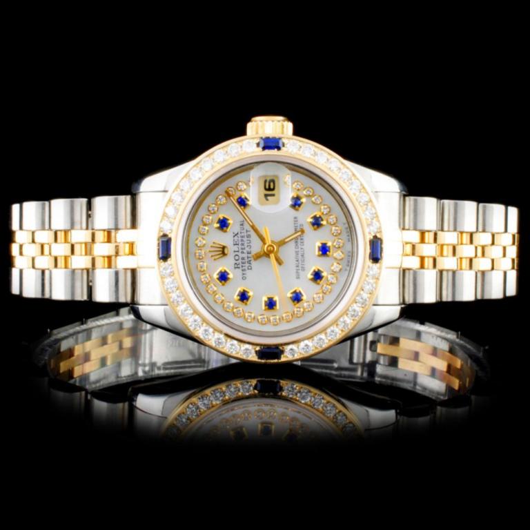 Rolex YG/SS DateJust Diamond Ladies Watch: Estimated Retail Replacement Value: $18,000.00 Ref: BAS16000 Item No.: ARXM022 Specification: Model: DateJust Oyster Perpetual Movement: Perpetual, Self Winding Chronometer Function: Instantaneous Dat