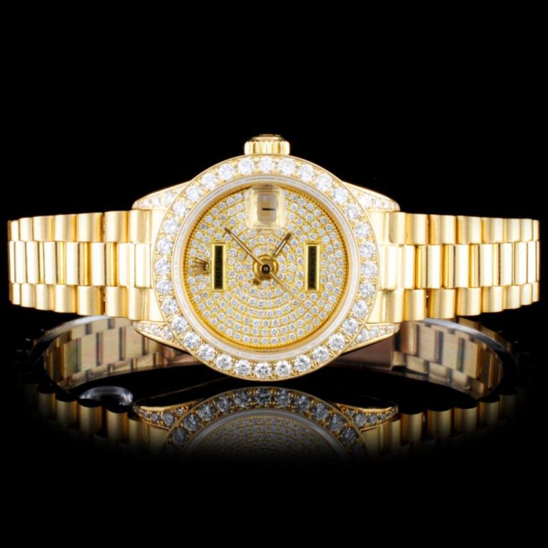 Rolex 18K Gold Presidential Ladies Diamond Watch: Estimated Retail Replacement Value: $46,280.00 Ref: WAG39400 Item No.: ARXR0014 Specification: Model: DateJust Oyster Perpetual Movement: Perpetual, Self Winding Function: Instantaneous Date Case Size