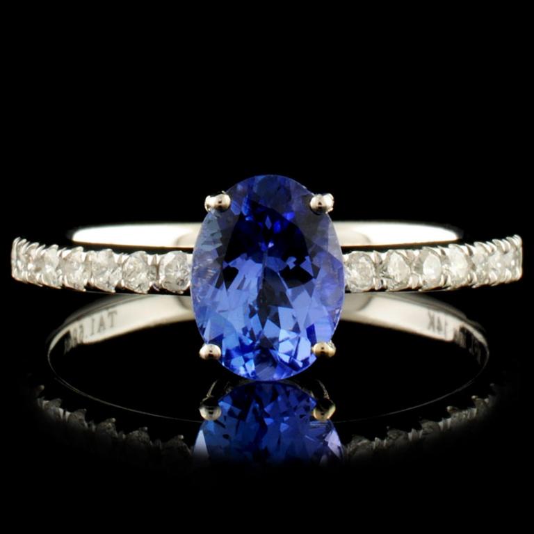 14K Gold 1.59ct Tanzanite & 0.21ctw Diamond Ring: Estimated Retail Replacement Value: $1,344.00 Ref: WAG768 Item no.: FA2057860005-BR6748ATZ Specification: Gold Content: Solid 14K White Gold Weight of Item: 1.95 grams Size: 7 Country Made: U.S.A Main