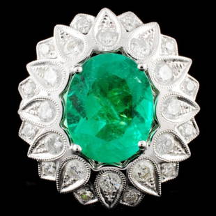 18K Gold 4.23ct Emerald & 1.93ctw Diamond Ring: Estimated Retail Replacement Value: $49,020.00Ref: WAG27600Item no.: ARA7021Specification:Gold Content: Solid 18K White Gold Weight of Item: 14.20 gramsSize: 8Country Made: U.S.A Main Gemstone: