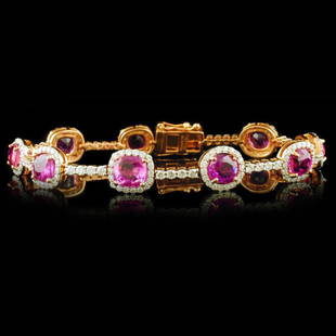 18k Gold 13.16ct Pink Sapphire & 3.10ctw Diamond B: Estimated Retail Replacement Value: $29,400.00Ref: WAG16800 Item no.: FA2058748024-MB2942APS1Gold Content: 18K White Gold Weight of Item: 16.85 grams Size: 6.75Main Gemstone: Natural Pink