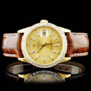 Rolex 18K YG Day-Date Baguette Diamond Watch: Estimated Retail Replacement Value: $27,700.00Ref: BAS44000Item no.: ARXZ-001Specification:Model: Oyster Perpetual Day-DateMovement: Perpetual, Self WindingCase Material: 18K Yellow GoldCase Size: