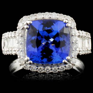 18K Gold 4.05ct Tanzanite & 1.05ct Diamond Ring: Estimated Retail Replacement Value: $22,000.00Ref: WAG8800Item no.: FA2054526032-BR6364ATZ1Specification:Gold Content: Solid 18K White GoldWeight of Item: 5.75 gramsCountry Made: U.S.ARing Size: