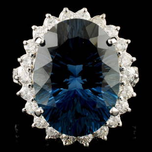 14K Gold 11.50ct Topaz & 1.65ctw Diamond Ring: Estimated Retail Replacement Value: $13,370.00Ref: WAG7640Item no.: LAI030018003-00295/ R16430Specification:Gold Content: Solid 14K White GoldWeight of Item: 10.20 gramsSize: 8Country Made: U.S.AMain
