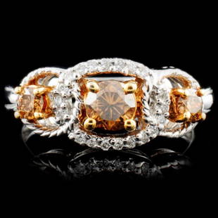 14K Gold 0.62ctw Fancy Color Diamond Ring: Estimated Retail Replacement Value: $4,382.00Ref: BAS2504Item no.: BB06898006-78877/CH286A+Specification:Gold Content: Solid 14K White GoldWeight of Item: 3.90 gramsSize: 6.5Country Made: U.S.AMain