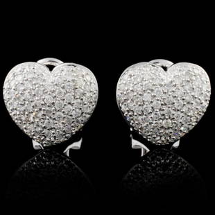 14K White Gold 1.04ctw Diamond Earrings: Estimated Retail Replacement Value: $6,770.00Ref: WAG2708Item no.: FA2053955020-E3579AGold Content: Solid 14K White GoldWeight of Item: 5.34 gramsMain Gemstone: Natural DiamondQuantity: 136