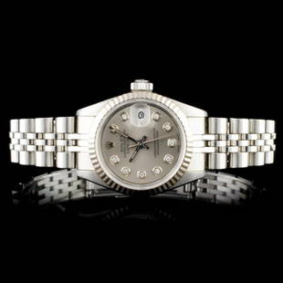 Rolex DateJust 18K & SS Ladies Wristwatch: Estimated Retail Replacement Value: $11,250.00Ref: IRA12004Item No.: ARXU-026Specification:Model: DateJust OysterMovement: Perpetual, Self WindingFunction: DateCase Size: 26mmCase Material: Stainless