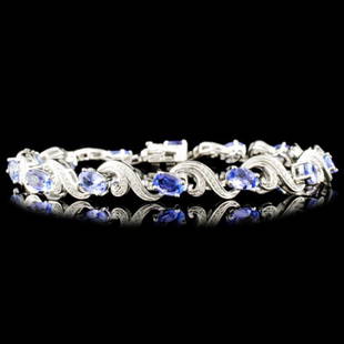 14K Gold 5.52ct Tanzanite & 0.41ctw Diamond Bracel: Estimated Retail Replacement Value: $8,645.00Ref: WAG4940Item no.: FA2056333PH25-MB2915ATZSpecification:Gold Content: 14K White GoldWeight of Item: 15.26 gramsSize: 7.5 inchesCountry Made: U.S.AMain