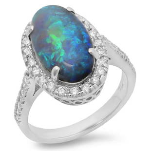 14K Gold 4.00ct Opal & 0.65ct Diamond Ring: Estimated Retail Replacement Value: $9,100.00Ref: BAS5200Item no.: JR20290-82981Specification:Gold Content: Solid 14K White GoldWeight of Item: 5.50 gramsCountry Made: U.S.AMain Gemstone: Natural