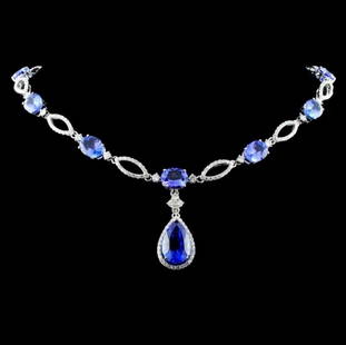 14K Gold 27.20ctw Tanzanite & 3.98ct Diamond Neckl: Estimated Retail Replacement Value: $67,200.00Ref: WAG26880Item no.: FA010133-N2062ATZ4Gold Content: 14K White GoldWeight of Item: 25.00gramsSize: 16.5Main Gemstone: Natural TanzaniteShape: