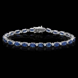 14k Gold 12.00ct Sapphire & 0.50ct Diamond Bracel: Estimated Retail Replacement Value: $9,200.00 Ref: WAG5800Item No.: ARA-CRA071Metal: 14k Solid White GoldSize: 7.5Total Item Weight: 9.00 gramsCountry Made: USAMain Stone: SapphireColor: BlueCarat