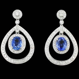 18K Gold 4.21ct Sapphire & 1.53ct Diamond Earrings: Estimated Retail Replacement Value: $25,212.00Ref: WAG10084Gold Content: 18K White GoldWeight of Item: 12.1 gramsMain Gemstone: Sapphire Shape: OvalWeight: 4.21 ctColor Grade: Blue 