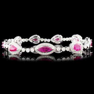 18K Gold 4.90ctw Ruby & 1.57ctw Diamond Bracelet: Estimated Retail Replacement Value: $17,024.00Ref: WAG9728Item no.: FA2056111030-MB2770ARSpecification:Gold Content: Solid 18K White GoldWeight of Item: 15.50 gramsSize: 7 inchCountry Made: U.S.AMain