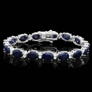 `14k Gold 40.00ct Sapphire & 1.50ct Diamond Bracel: Estimated Retail Replacement Value: $26,900.00Ref: WAG10200Item No.: ARA-CRA110Metal: 14k Solid White GoldSize: 7Total Item Weight: 20.00 gramsCountry Made: USAMain Stone: SapphireColor: BlueCarat