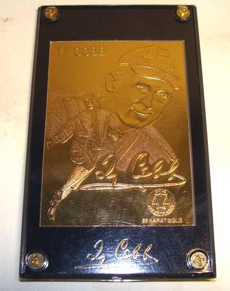Three 22k Gold Baseball Cards Griffey Mays & Ty: 1- 22k Gold Ty Cobb Baseball Card in Plexiglass 1- 22k Gold Ken Griffey Jr Baseball Card in Plexi 1- 22k Gold Willie Mays Baseball Card in Case Each baseball card is encased in pure 22k gold and then