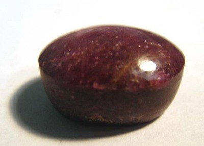 Natural Star Ruby Loose gem stone 14.95ct.: One oval cabochon cut natural star ruby approximate weight of 14.95 ct, declasse clarity, medium dark, very slightly brownish, strongly purplish red color, (GIA stpR 6/3), cut is good. This gemstone h