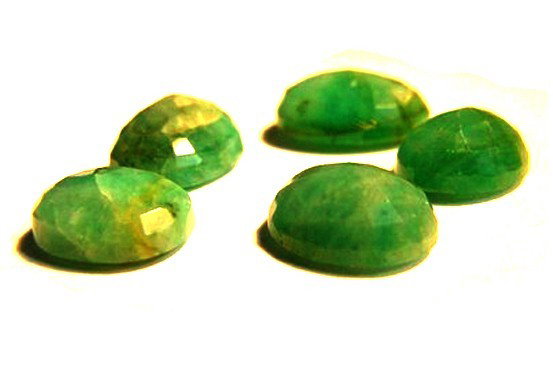 28.35 Ct TW Natural Oval Emerald (Beryl) Loose gemstone: Five Natural Oval Emerald (Beryl) 28.35ct Loose gemstones, color is light green. GLA appraised on 7/22/2009 Appraisal Value: $4989 (See certificate of Authenticity for more details)