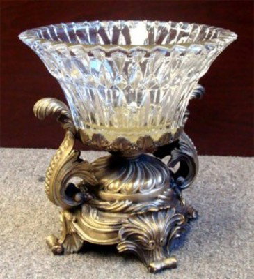 Ornate Faceted Crystal Bowl & Bronze Base 11": Beautiful Ornate Bronze base with a heavy faceted crystal scalloped bowl attached to the base. Dimensions: Bowl 10" Diameter Total Height 11" Including Base Weight 15lbs