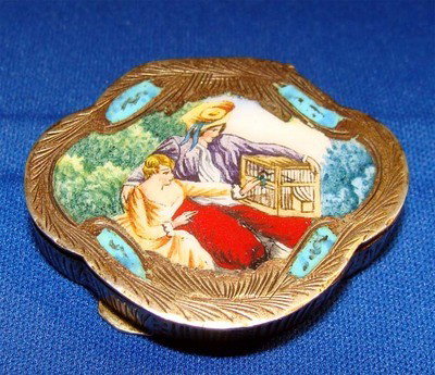 Engraved And Enameled .800 Silver Compact Man showing C: This nice enamel painting is framed by beautiful silver engraving with turquoise enamel accents. Stamped 800 and the number 20 on the inside. Dimensions 1.5"x1.5", weight 20grams.