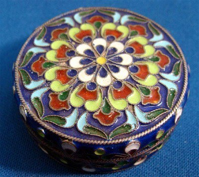 Elaborate Enamel .84 Silver Box Engraved: This box has a background of blue enamel with an art nouveau floral decoration in green, yellow, red and white, quite wonderful. Stamped 84 on lid and base with hallmark. Dimensions 1. 75"x. 75" weigh