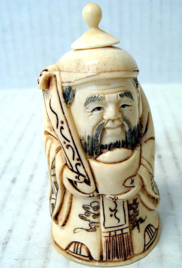 Chinese Charming ox-bone Carved Buddha snuff bottle: Spoon included, dimensions 3.5" by 2.5" wide