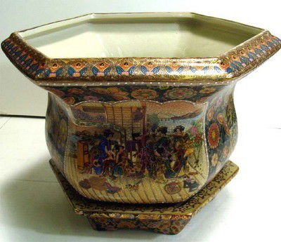 Chinese Blue Porcelain Decorated Hexagon Planter 16": Hand painted gilded porcelain planter with porcelain base, this painting shows a traditional japanese scene with young women in colorful kimonos, framed by an intricate butterfly and floral design. 16