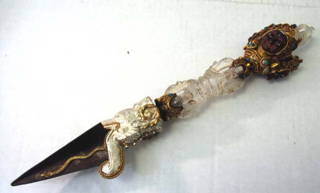 Silver & Carved Crystal Nepalese Ceremonial Phurba Dagg: This amazing Phurba is constructed of sterling silver, some gold, brass, turquoise and coral beads, the center and end are carved rock crystal, the three faces are carved gem stone. Dimensions 14" lon