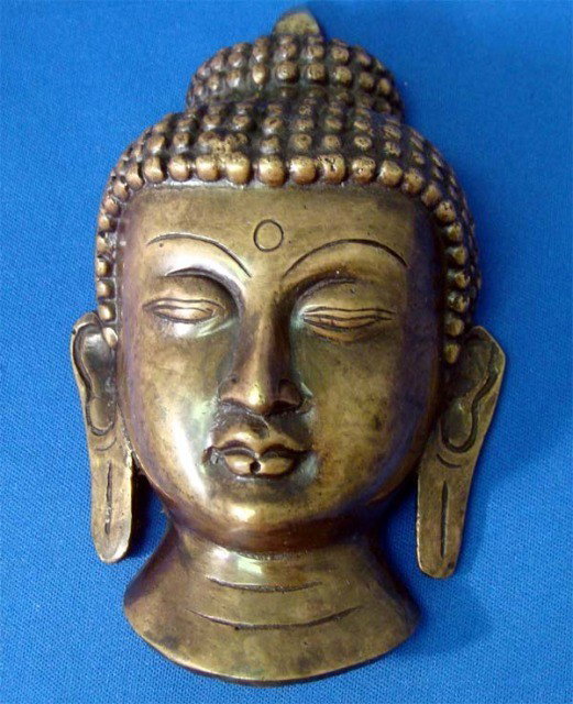 Nepalese Buddha Head Bronze Wall Statue 5.5": This wonderful buddha head is hand crafted in traditional style of nepal, made to be hung on the wall. Dimensions 5. 5" x 3. 5"