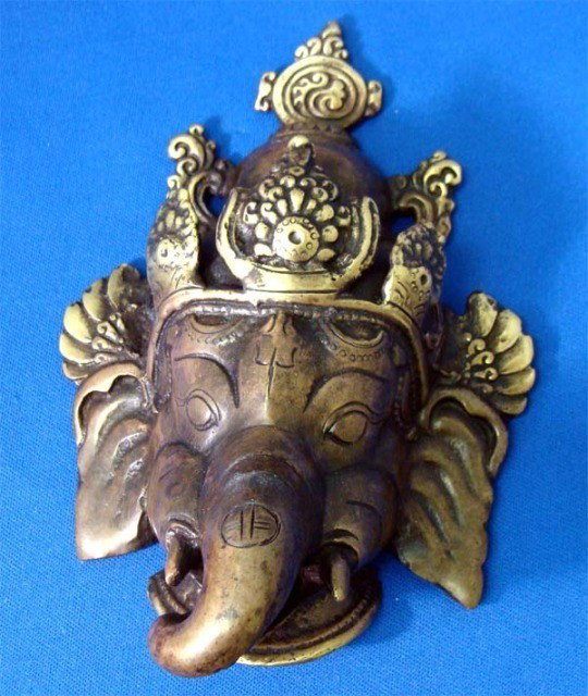 Nepalese Bronze Buddah Elephant Ganesha Nepal: This wonderful Buddha Head is hand crafted in traditional style of Nepal, made to be hung on the wall. Dimensions 5.5X4