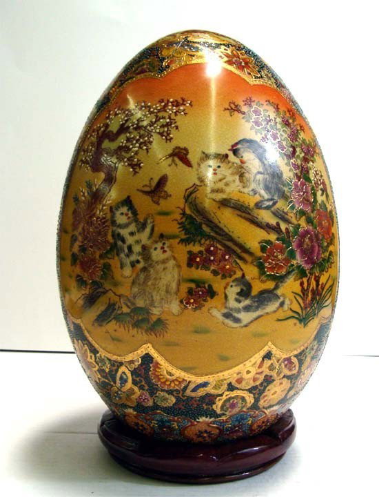 12" Tall Porcelain Cloissone Egg Cats at Play Asian: Another Beautiful porcelain cloissone egg on stand, the painting shows kittens playing in a asian garden