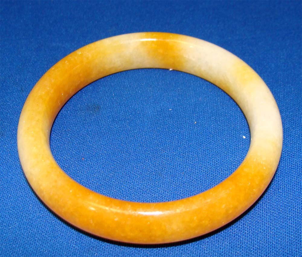 One Chinese Yellow & White Jade Bangle Bracelet: inside diameter 2.25"
