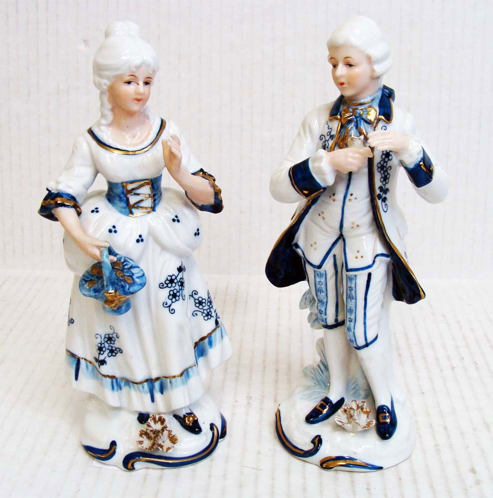 KPM Porcelain Classical Statues Blue & White 9": (lot of 2) Porcelain gilt and polychrome decorated figural classical statues, each decorated on a white ground, signed KPM, (Konigliche Porzellan Manufaktur). From the Lee Estate in Beverly Hills, dim