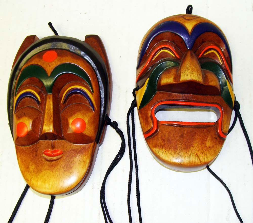 Two Dramatic Wood Decorative Wall Hanging Face Masks: From the Lee Beverly Hills Estate, Dimensions: (1) 5.75" by 3.75" (2) 5.5" by 3.5"