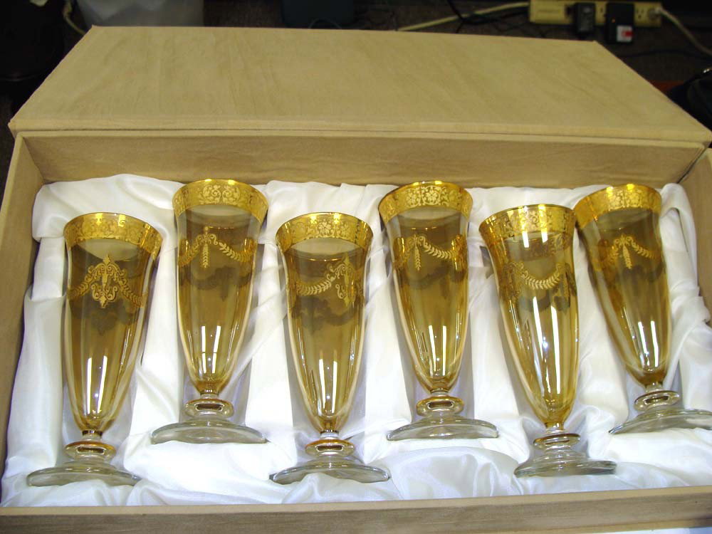 Set of Six Gold Leaf Apertif Glasses with Case: Very heavy gold leaf designs, In a nice case, dimensions 6 1/2" tall by 3" diameter each