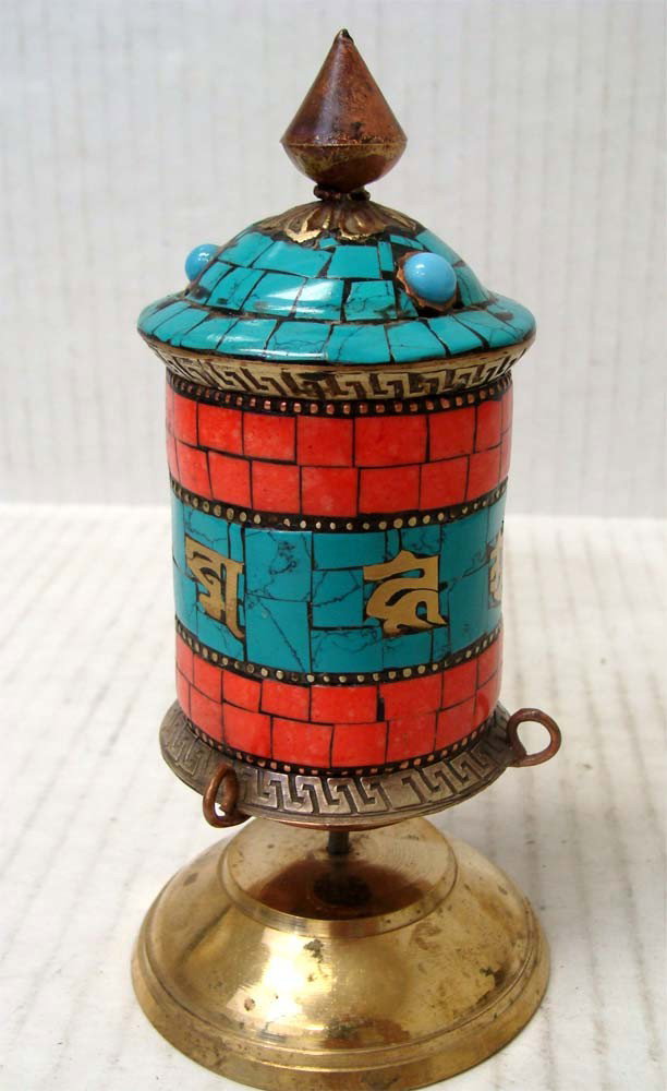 Nepalese Tibetan Prayer Wheel Copper & Brass & Coral: With inlaid Coral and Turquoise, this Tibetan Buddhist prayer wheel is encircled by brass Tibetan Sanskrit, spelling out "Om Mani Padme Hung", and 8 lucky signs, the Tibetan Buddhist meditation prayer