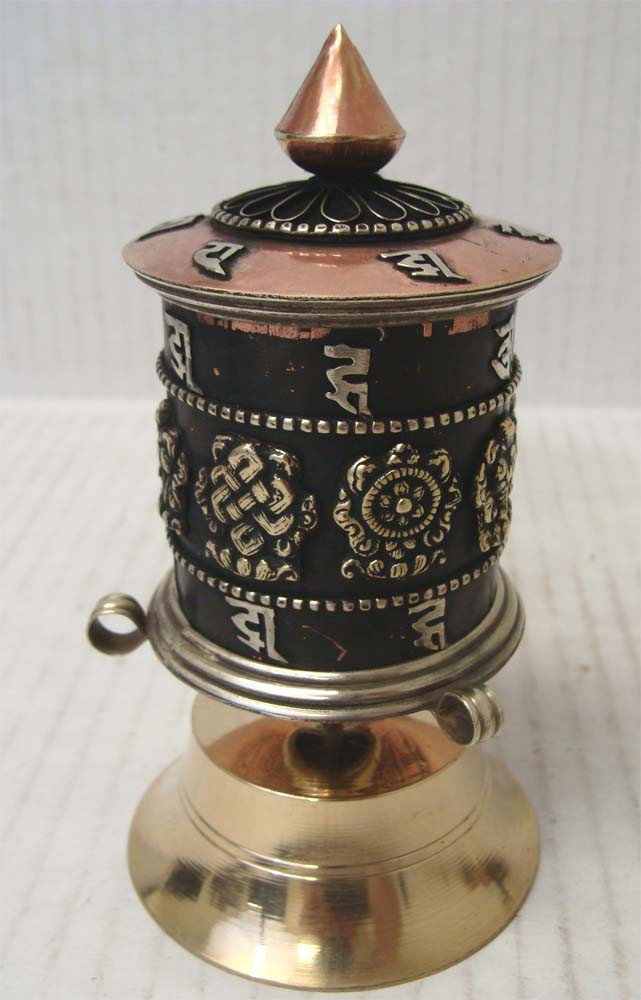 Nepalese Tibetan Prayer Wheel Copper & Brass: Tibetan Buddhist prayer wheel has a row of brass Tibetan Sanskrit, spelling out "Om Mani Padme Hung", and 8 lucky signs, the Tibetan Buddhist meditation prayer. It contains a prayer scroll. PAK1W68