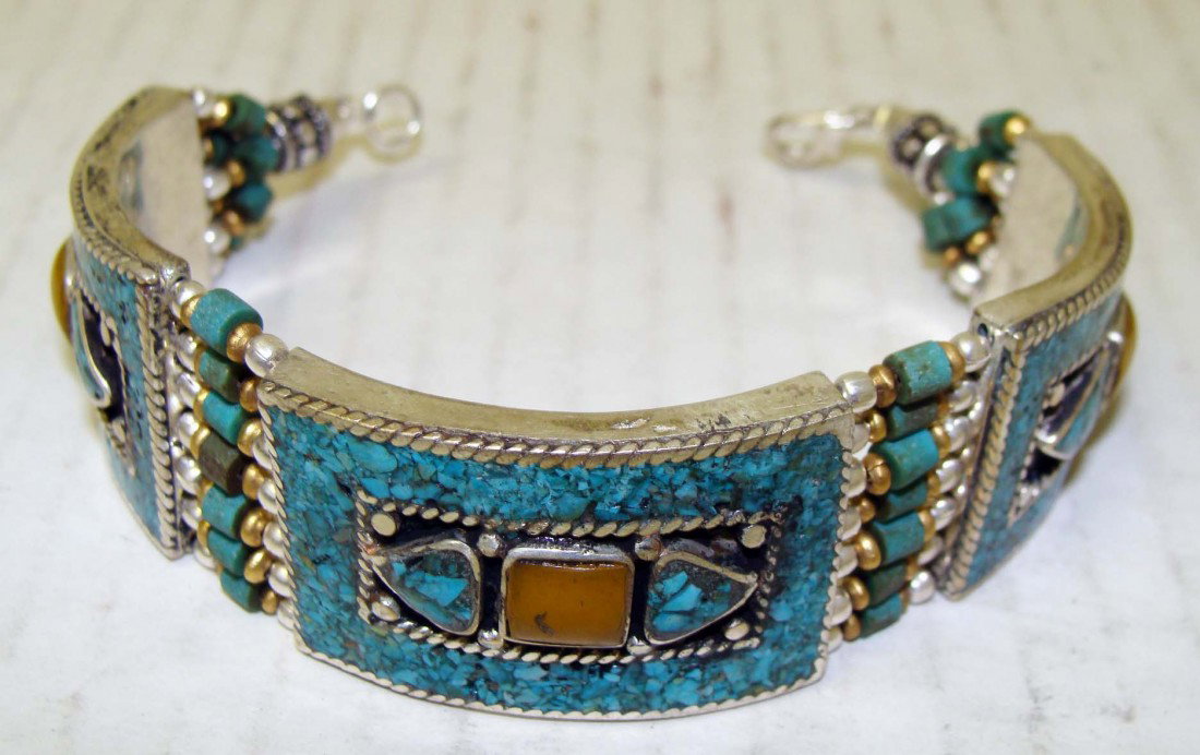 Nepal Nickel Silver Turquoise & Amber Link Bracelet: Inlaid with turquoise mosaic and large amber beads. Dimensions: 7" long K10W5