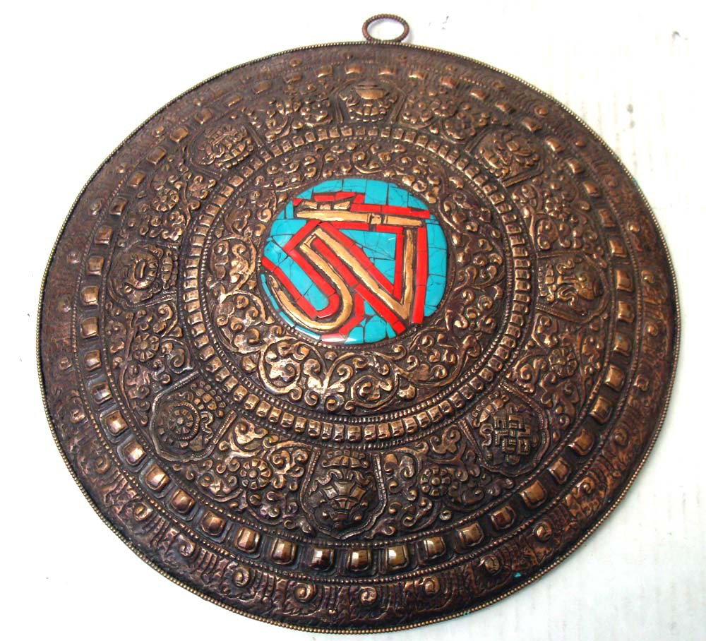 Nepalese Tibetan Om Mandala Copper Wall Hanging: Made of a bronze/copper metal, with very intricate detailed engraving. In the center is an inlaid design of turquoise, coral and polished copper, Dimensions 12" in diameter, PAK3W81