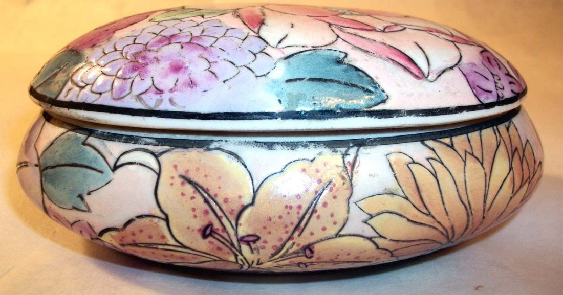Chinese Famille Rose porcelain Tongzhi Paste Box: Contains pictures of Roses, Lillies and Peonies, painted with pink, purple and mauve. 4 ½” around by 2 ¼” tall. Weighs approximately 8oz. BLK3W10