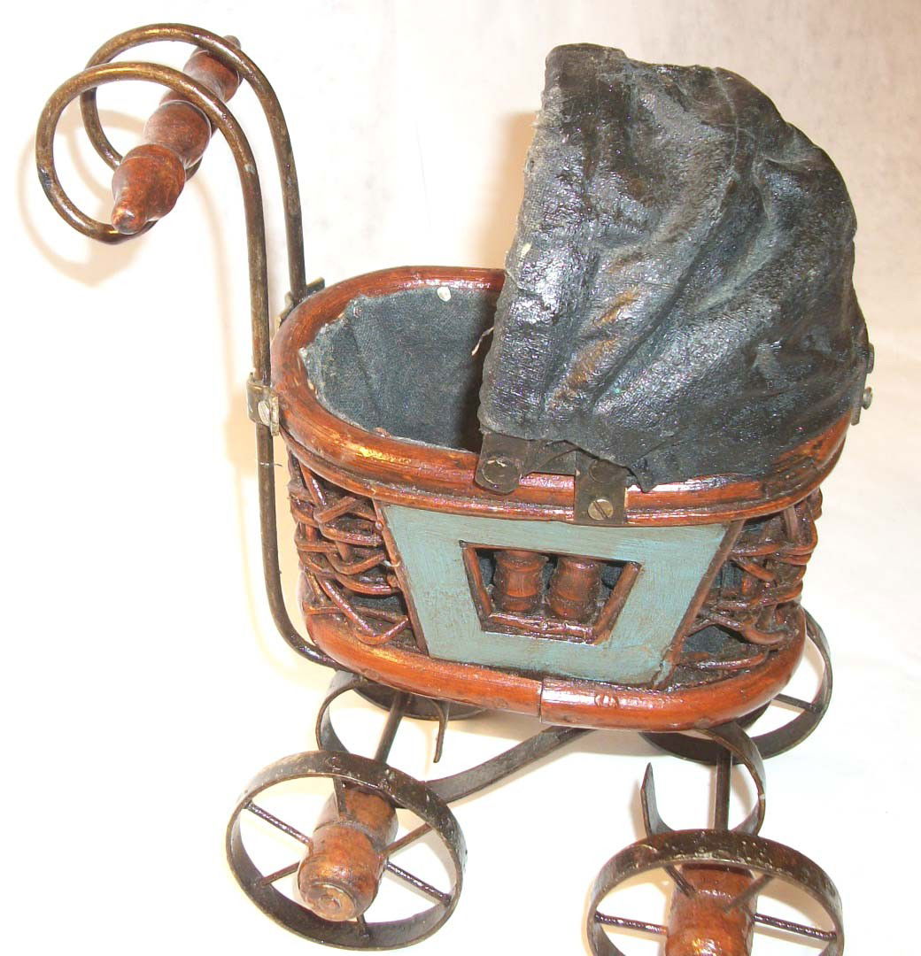 Vintage Baby Doll Carriage from circa 1900: Dimensions 9” tall by 7” wide. BLK2W25