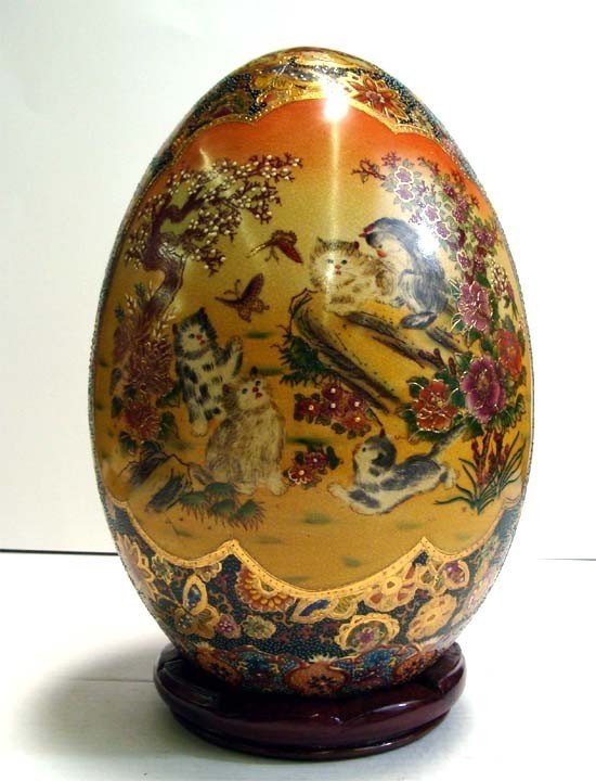 12" Tall Porcelain Cloissone Egg Cats at Play Asian: Another Beautiful porcelain cloissone egg on stand, the painting shows kittens playing in a asian garden